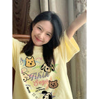 Creamy Cartoon Dog Graphic Tee - kawaii-inspired outfit in pastel colors - 54373093