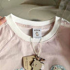 Pink Towel-Embroidered Cat Raglan Tee - kawaii-inspired outfit in pastel colors - 15986218